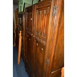 A REPRODUCTION CARVED OAK DOUBLE DOOR WARDROBE, width 100cm x depth 52cm x height 176cm, together