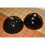A PAIR OF EARLY 20TH CENTURY ENAMELLED METAL LAMPSHADES, black exteriors, white interiors,