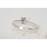 AN 18CT WHITE GOLD SINGLE STONE DIAMOND RING, an emerald cut diamond with a four-claw setting to the