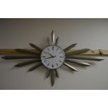 A METAMEC 1960'S ATOMINIUM SUNBURST WALL CLOCK, with Arabic numerals (sd, broken glass and backplate