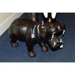 A LEATHER COVERED MODEL OF A HIPPO, plastic teeth, length 65cm x height 45cm