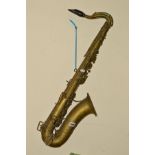 A BRASS BUFFET CRAMPON SAXOPHONE, in need of refurbishment