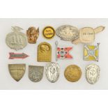 A BOX CONTAINING FOURTEEN WWII PERIOD GERMAN 3RD REICH TINNIE BADGES AND WHW (WINTER HILFSWERK)