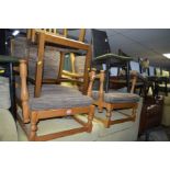 A PAIR OF ERCOL PINE FIRESIDE CHAIRS