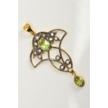 AN OPEN WORK PENDANT, designed with a central oval peridot, with diamond and seed pearl floral