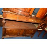 AN EDWARDIAN WALNUT TWO TIER BUFFET, raised back above two drawers, central shelf above double