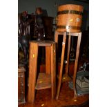 A COOPERED OAK AND COPPER PLANTER on a seperate base together with an oak plant stand (2)