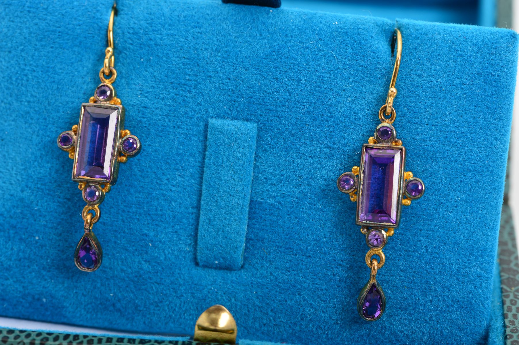 A PAIR OF AMETHYST DROP EARRINGS, each with a rectangle cut amethyst in collet setting with a