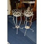 A PAIR OF 20TH CENTURY PAINTED WROUGHT IRON PLANT BASKETS on seperate stands
