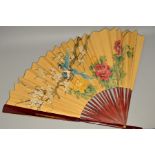 A LARGE CHINESE DECORATIVE FAN, handpainted with birds and flowers on silk and paper, height of