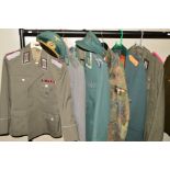 FIVE ITEMS OF GERMAN MILITARY UNIFORMS, uniform jacket marked inside NVA, K, 48, 1850, T/1, the