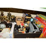 FOUR BOXES OF CAMERAS, CLOCK AND WATCHES AND PARTS, SPORTING TROPHIES AND BOXED TOYS AND GAMES, etc,