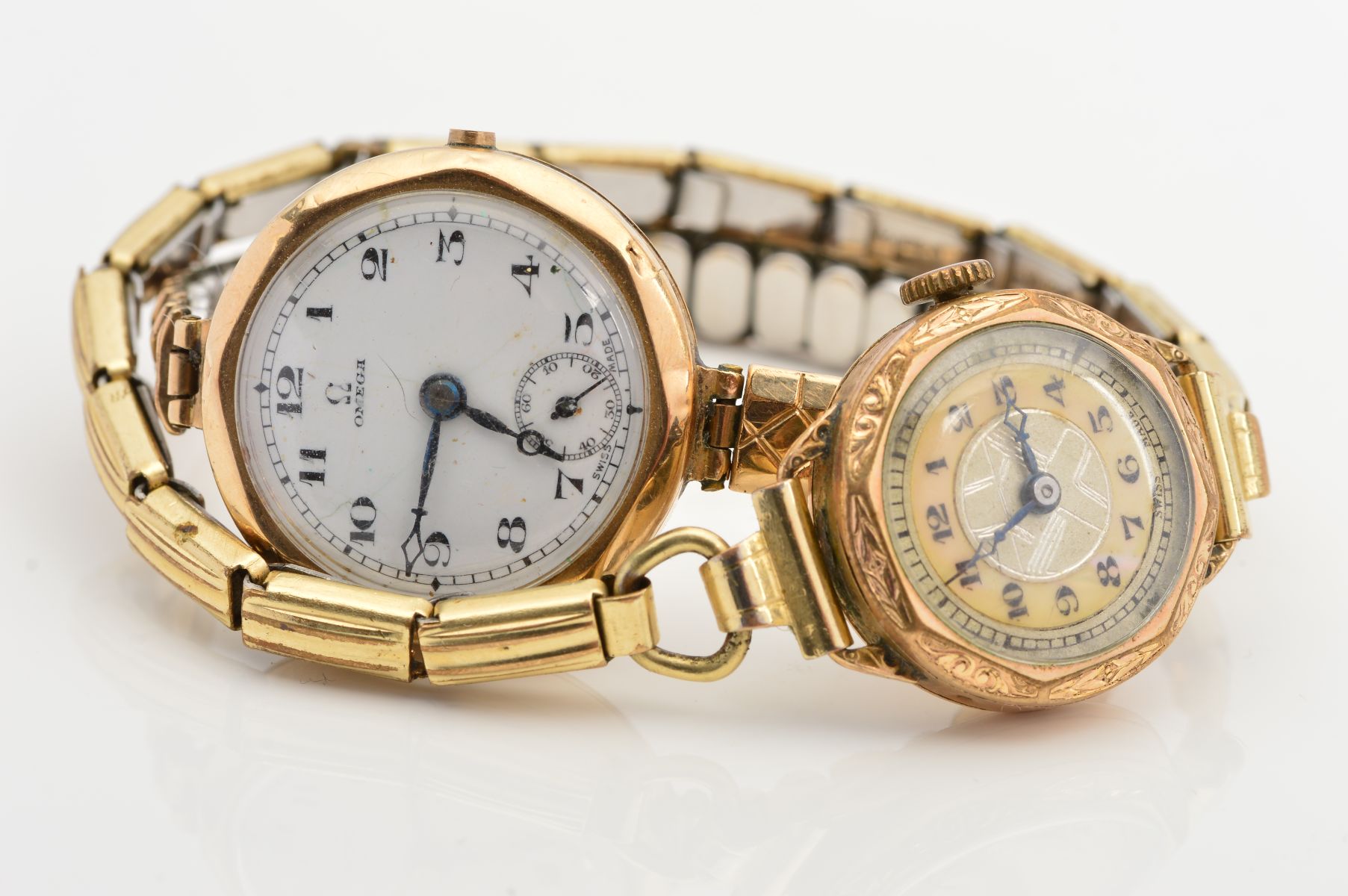 A 9CT GOLD OMEGA MECHANICAL WRISTWATCH, white enamel Arabic numeral dial, subsidiary seconds dial,