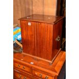 AN EDWARDIAN WALNUT LOG BUCKET with a hinged top