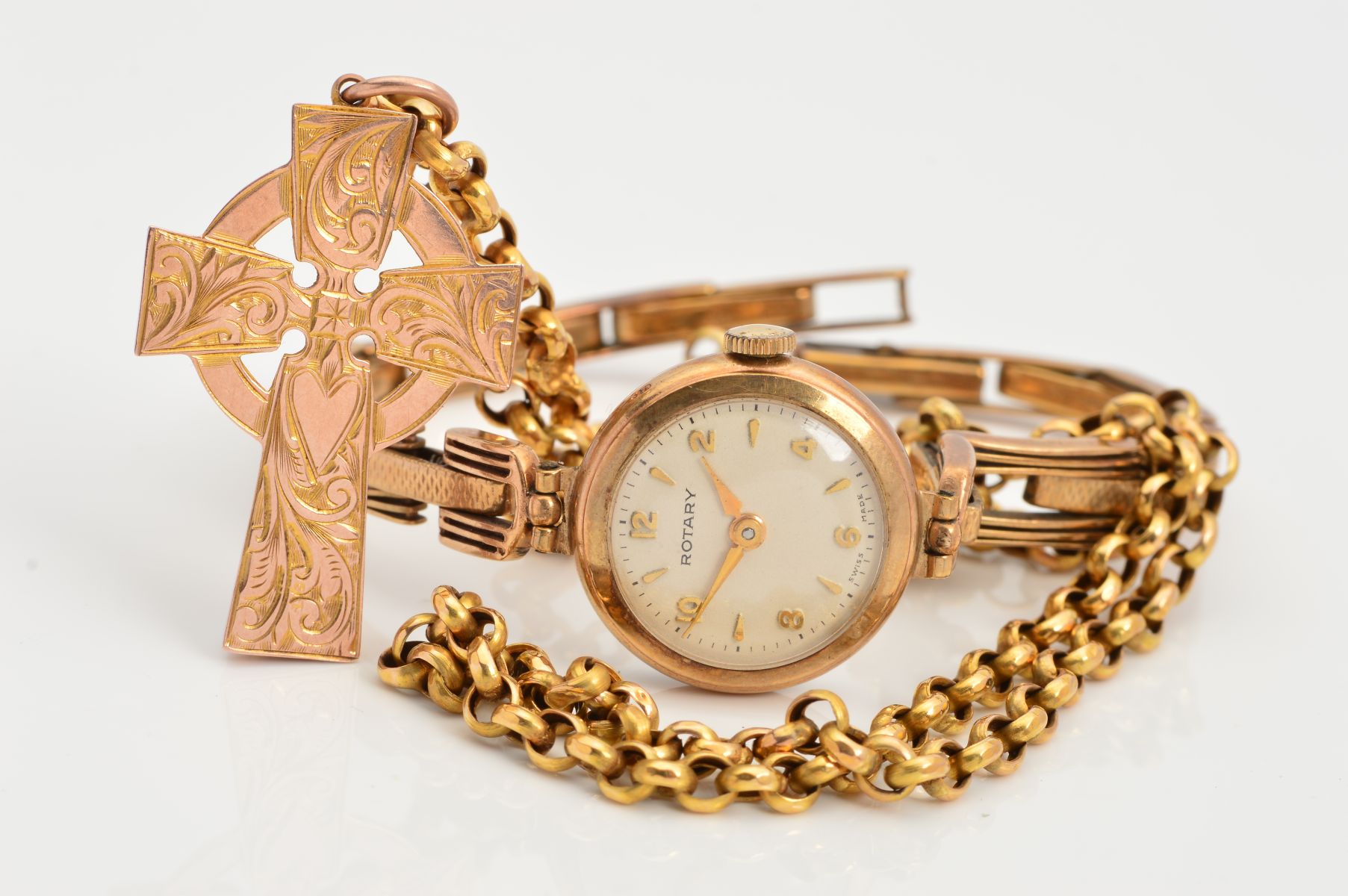 A 9CT GOLD WATCH, PENDANT AND CHAIN, the lady's Rotary wristwatch with a circular face and