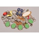 A SELECTION OF JEWELLERY to include a Norwegian enamelled butterfly brooch and bracelet charms,