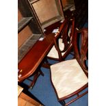 A REPRODUCTION MAHOGANY TWIN PEDESTAL DINING TABLE, one additional leaf and six matching chairs (the