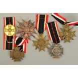 A NUMBER OF GERMAN WWII 3RD REICH MEDALS, as follows, War Merit medal, very small ring has been re-