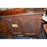 A VICTORIAN STAINED PINE PANELLED TWO DOOR CABINET/CHEST, with the doors revealing eight long