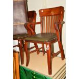 A PAIR OF EARLY 20TH CENTURY STAINED OAK OFFICE ARMCHAIRS (2)