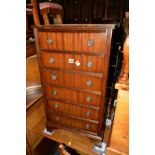 A MODERN MAHOGANY CHEST OF SIX DRAWERS