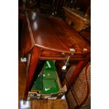 A GEORGE III MAHOGANY OVAL PEMBROKE TABLE, rounded ends, fitted with a drawer and a dummy drawer, on