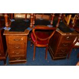 AN EARLY 20TH CENTURY OAK DESK, the top with a concave centre above eight drawers, width 137cm x