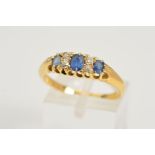 AN EARLY 20TH CENTURY GOLD SAPPHIRE AND DIAMOND RING, designed as three graduated oval sapphires