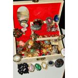 A JEWELLERY BOX CONTAINING COSTUME JEWELLERY, to include mainly brooches, a pair of Monet earrings