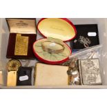 A SELECTION OF JEWELLERY ETC, to include a silver hinged bangle, four lockets, two silver ingot