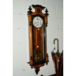 A 20TH CENTURY WALNUT AND EBONISED VIENNA WALL CLOCK (two weights, winding handle)