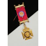 A 9CT GOLD MASONIC MEDAL, for the Royal Antediluvian Order Of The Buffaloes, with enamel detail,