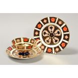 A ROYAL CROWN DERBY IMARI CUP AND SAUCER, together with matching side plate, '1128' pattern,