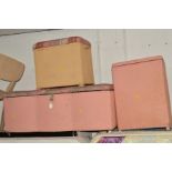 A PINK PAINTED WICKER OTTOMAN and two blanket boxes (3)