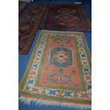 A LATE 20TH CENTURY BALUCH STYLE RED, BLUE GROUND CARPET SQUARE, 293cm x 198cm together with a