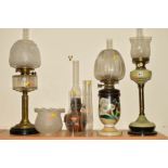 FOUR OIL LAMPS AND LOOSE to include a brass twin burner oil lamp having faceted glass reservoir