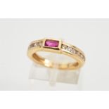 A RUBY AND DIAMOND RING, designed as a rectangular collet set ruby to the channel set brilliant