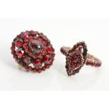 A BOHEMIAN GARNET BROOCH AND RING, the circular brooch with central oval garnet cabochon within a