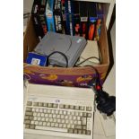 A COMMODORE AMIGA A600 VINTAGE PERSONAL COMPUTER, with PSU, a Sony Playstation with two