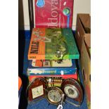 FOUR BOXED GAMES with three novelty time pieces