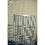 A METAL FRAMED 4' 6'' BED FRAME and mattress