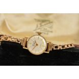 A LADIES TALIS MECHANICAL WRISTWATCH, silvered dial with gold batons, 17 jewel movement, round