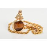 A 9CT GOLD GEM FOB AND ALBERT CHAIN, the circular fob set with tiger's eye to one side and banded