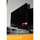 AN LG 21.5'' TV together with a Bush DVD player (two remotes) (2)