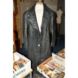 A GERMAN MADE LONG LENGTH LEATHER COAT, the coat is gunmetal grey, and has a makers label inside a