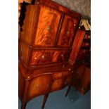 A MODERN MAHOGANY SERPENTINE SIDEBOARD with a single central drawer, together with a matching two