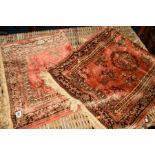 TWO 20TH CENTURY SILK RUGS, pink ground with Greek decoration, 102cm x 66cm (2)