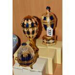 THREE MODERN FABERGE STYLE MUSICAL EGGS, with boxes