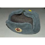 A RUSSIAN WW2 ERA WINTER 'USHANKA' STYLE WOOLEN HAT, the inside has a pleated lining with makers