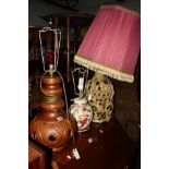 A WEST GERMAN GLAZED LAMP, together with two other lamps (3)